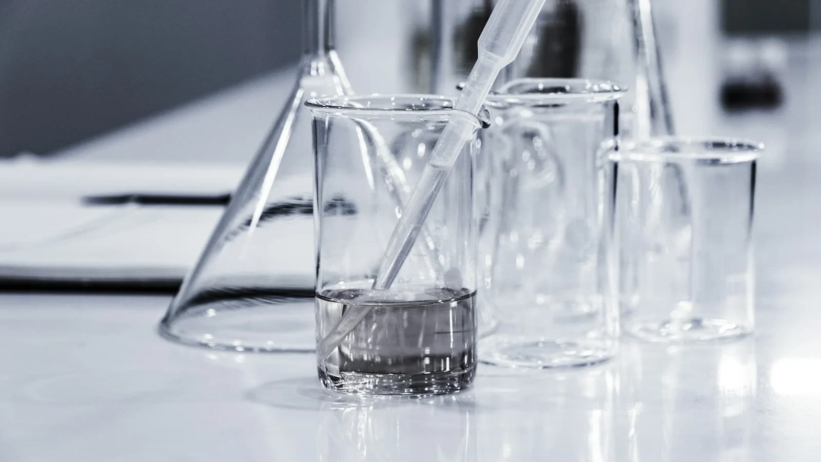 Botanical research laboratory setting with tropical plant silhouettes representing scientific…